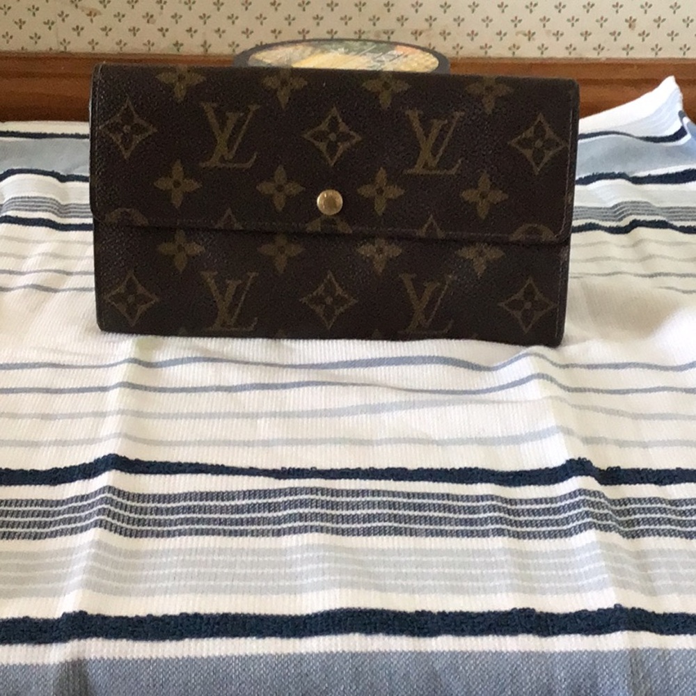 Louis Vuitton Monogram wallet.